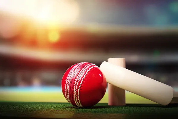 A close-up shot of golden coins falling around a spinning roulette wheel, representing immersive casino action at KRIKYAA.