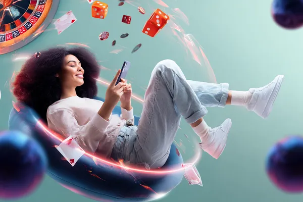 KRIKYAA মোবাইল ক্যাসিনো — যেকোনো সময়, যেকোনো স্থানে খেলুন একটি উৎসবমুখর অনুষ্ঠানে স্মার্টফোন ব্যবহার করছেন একজন খেলোয়াড়—যা KRIKYAA–এর সম্পূর্ণ মোবাইল-ফ্রেন্ডলি অভিজ্ঞতাকে তুলে ধরে।